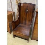 A 19th century oak 'shepherd' chair, width 54cm, depth 50cm, height 117cm