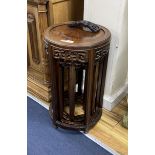 A nest of four Chinese hardwood circular tables, largest diameter 40cm, height 67cm