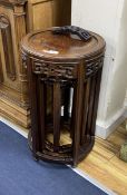 A nest of four Chinese hardwood circular tables, largest diameter 40cm, height 67cm