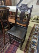 A 17th century style Continental oak back stool, width 40cm, depth 34cm, height 102cm