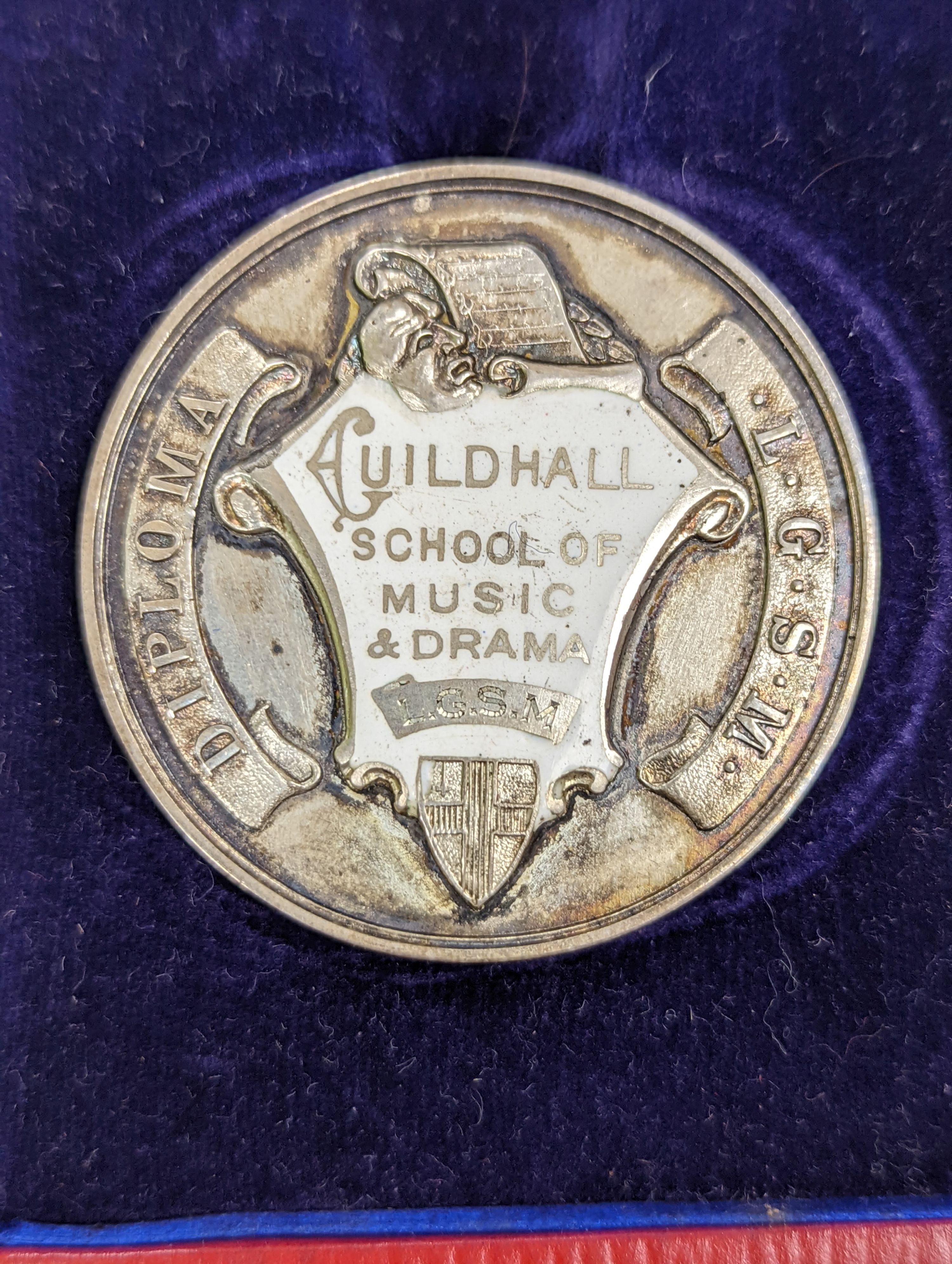 A silver Guildhall School elocution medal, 1935, and a humorous watercolour - Image 2 of 3