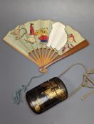 A 19th century Japanese lacquer three-case inro and a small Japanese painted fan with bamboo guards,