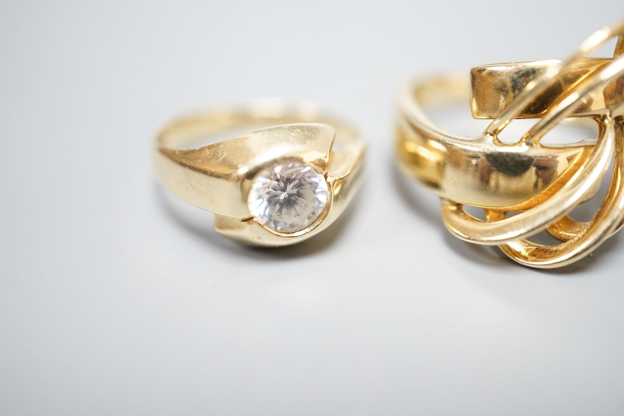 An Italian 750 scroll ring, size P, 5.5 grams and a 585 and white stone ring, gross 3.9 grams. - Image 3 of 5