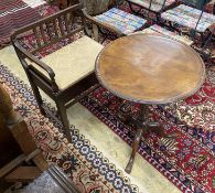 A Georgian mahogany circular tilt top tripod table with dished top, diameter 54cm, height 70cm