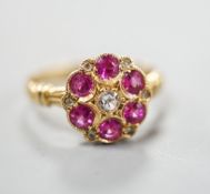 A George V 18ct gold, synthetic ruby, white sapphire? and diamond chip set cluster ring, size K,