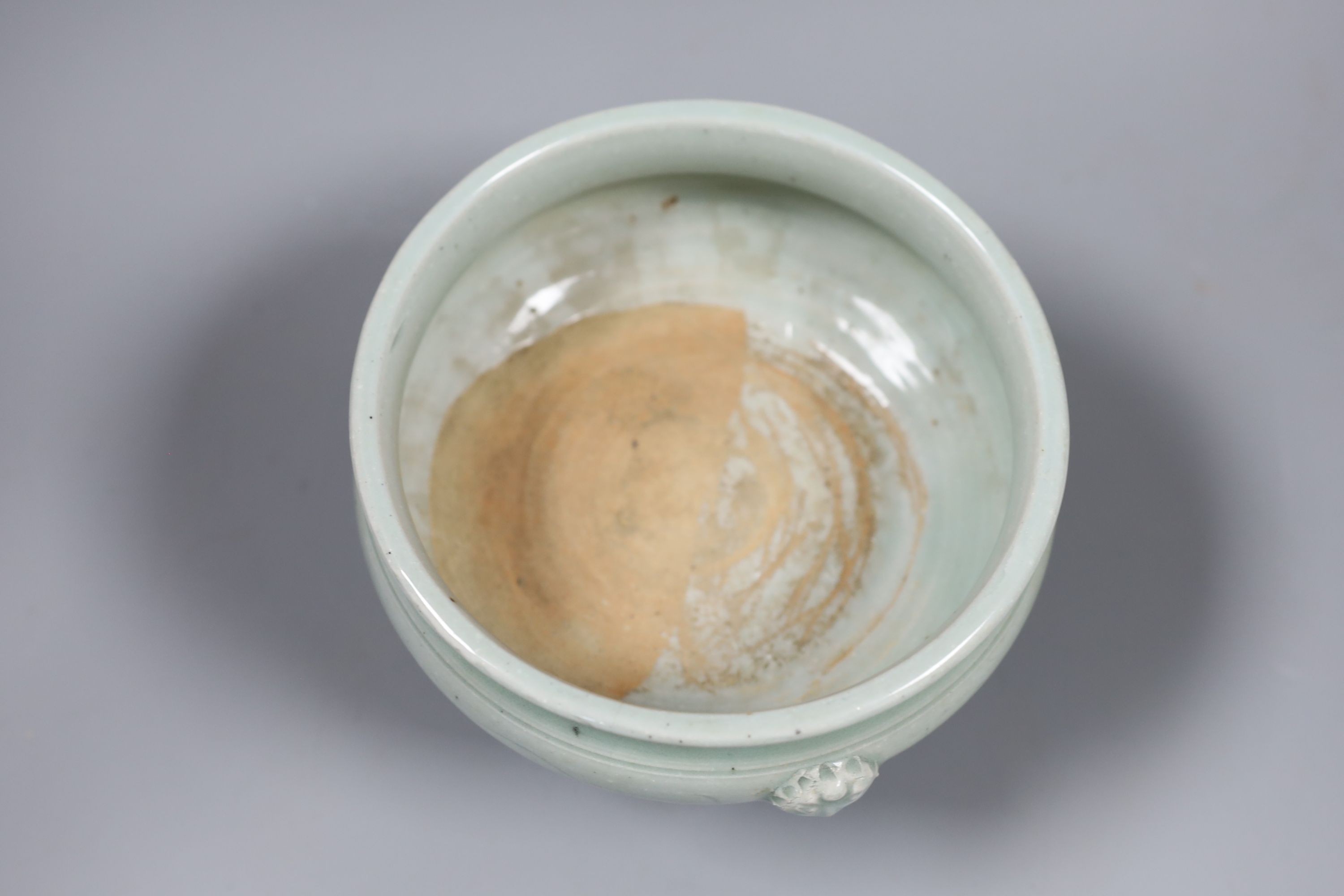 A Chinese celadon tripod censer, Ming or later, 16.5 cm diameter - Image 3 of 4