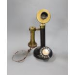 A brass mounted pillar telephone,34cms high.