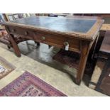 A Victorian Gothic style walnut two drawer library table, width 152cm, depth 78cm, height 76cm