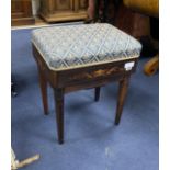 An Edwardian marquetry inlaid rosewood adjustable piano stool