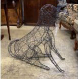 A wirework seated dog garden ornament, height 70cm