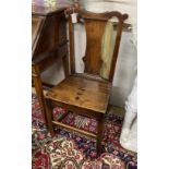 An 18th century oak wood seat chair