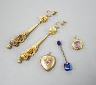 A pair of yellow metal drop earrings, overall 89mm, a simulated sapphire pendant and two other