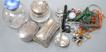 A silver and enamel mounted glass scent bottle(a.f.), three silver mounted glass toilet jars and