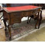 A reproduction George III style serpentine mahogany kneehole writing table, width 107cm, depth 55cm,