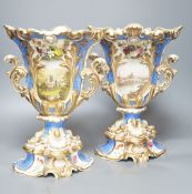 A large pair of 19th century Grainger & Co. vases with scenes of Worcester and Malvern on a blue