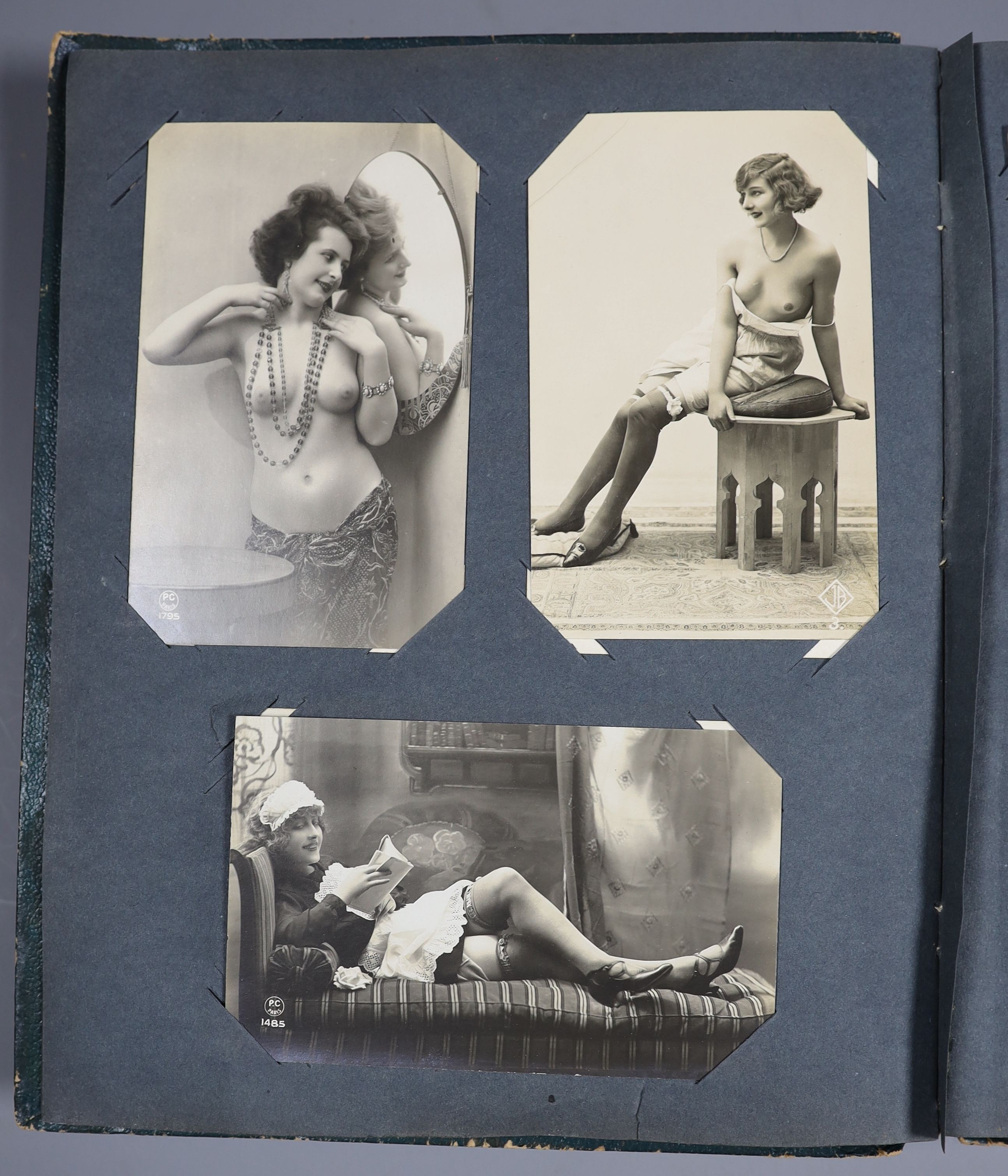 An Edwardian green postcard album, mounted with 68 risque cards and a brown album mounted with - Image 7 of 9