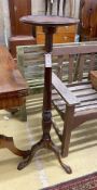 An Edwardian George III style mahogany torchere, height 176cm