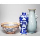 A Chinese blue and white Prunus vase, a Chinese enamelled porcelain bowl and a pale blue crackle
