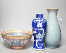 A Chinese blue and white Prunus vase, a Chinese enamelled porcelain bowl and a pale blue crackle