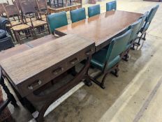 An early 20th century oak dining suite comprising rectangular table, length 216cm, width 106cm,