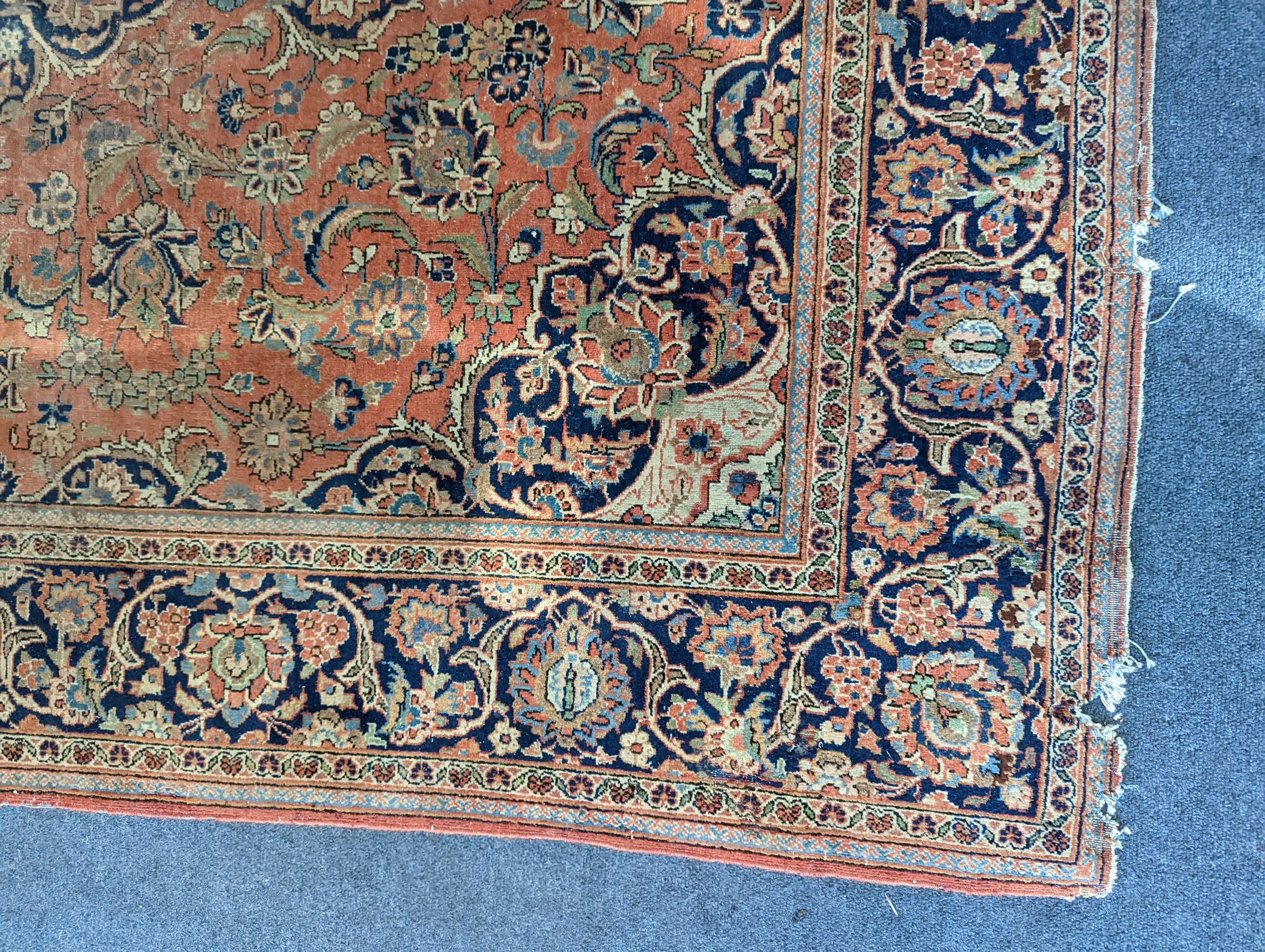 A Kashan red ground rug, 200 x 132cm - Image 2 of 3