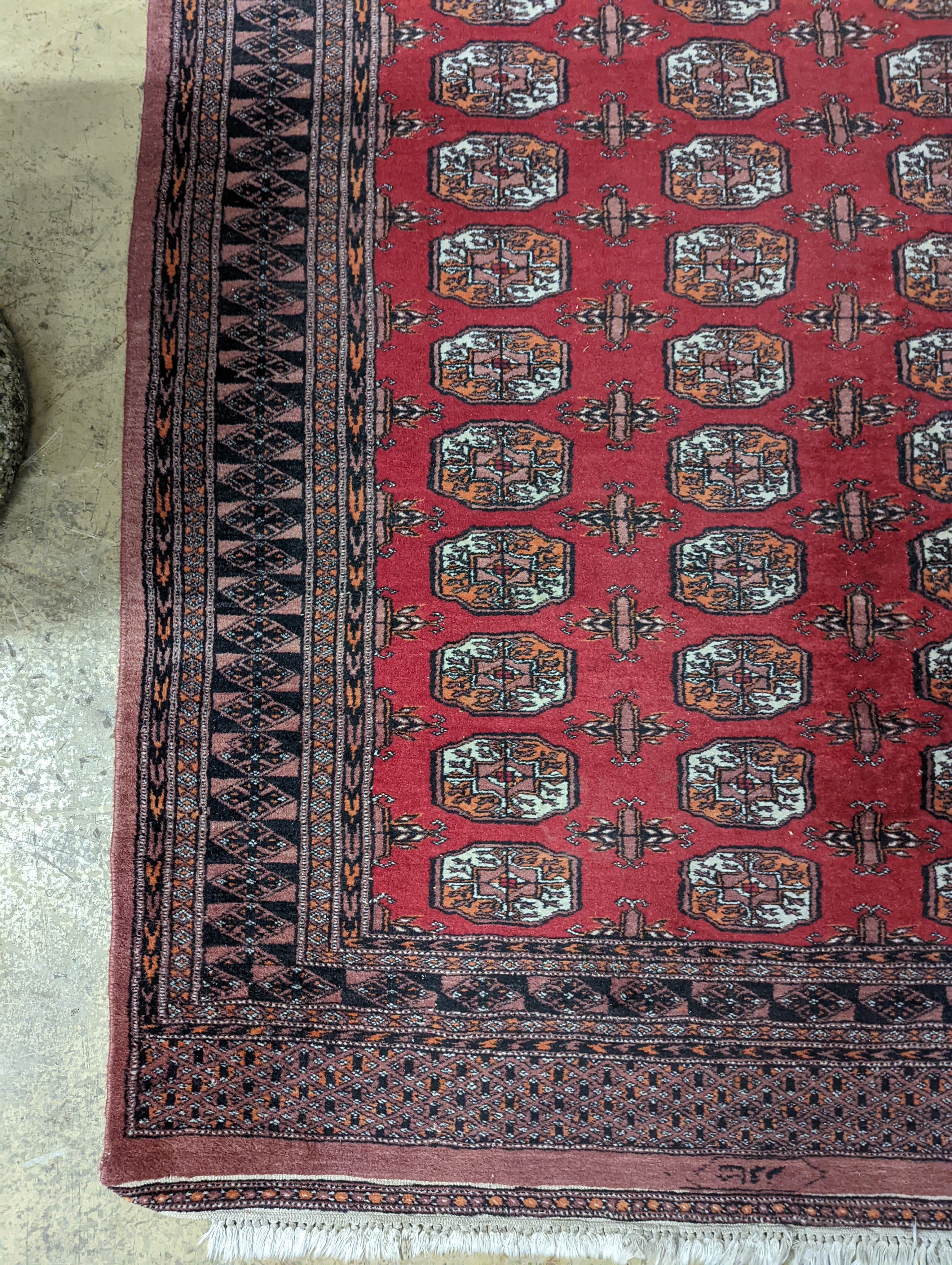A Bokhara red ground rug, 196 x 126cm - Image 2 of 5