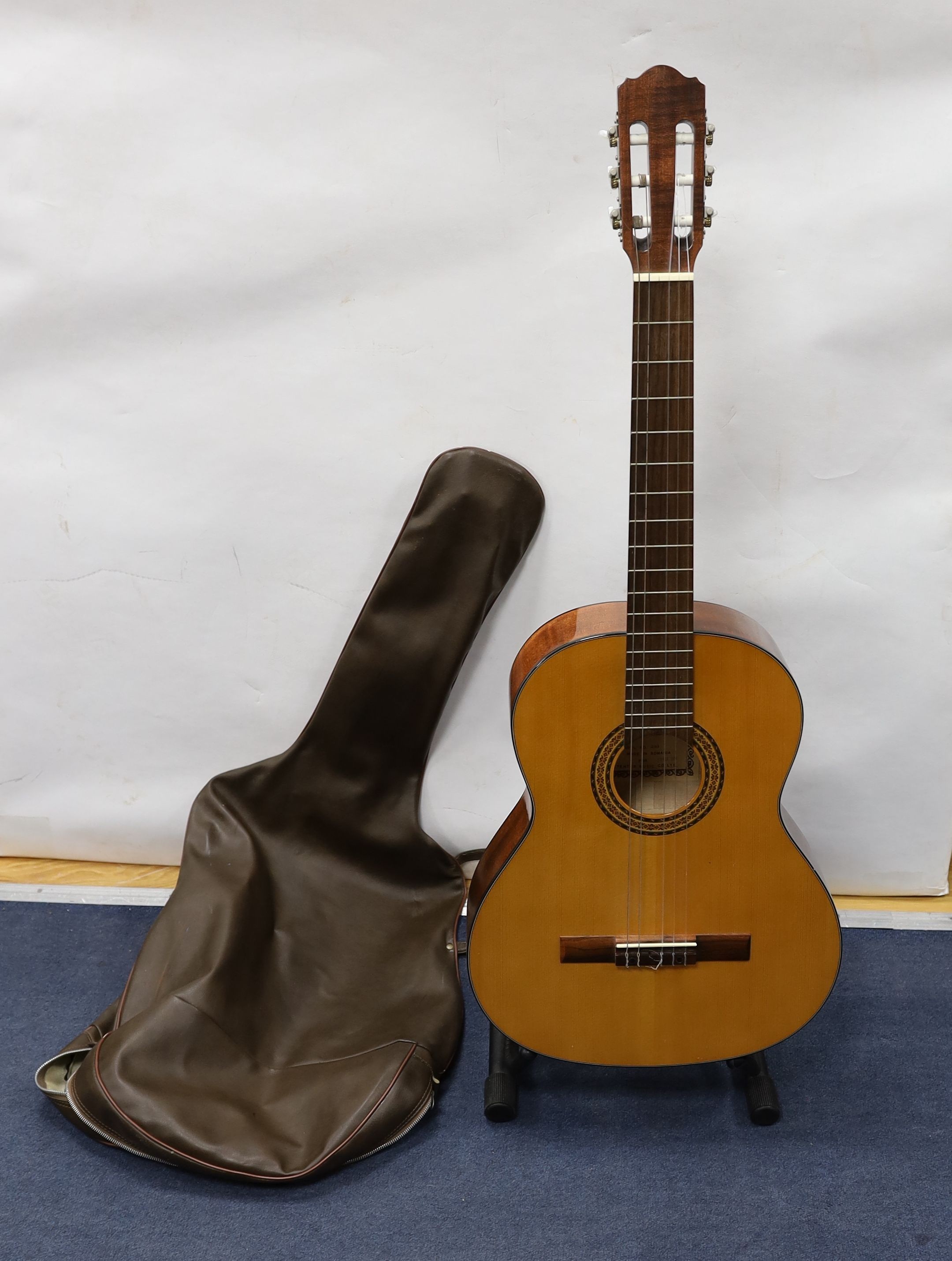 A Hokada classical guitar with case