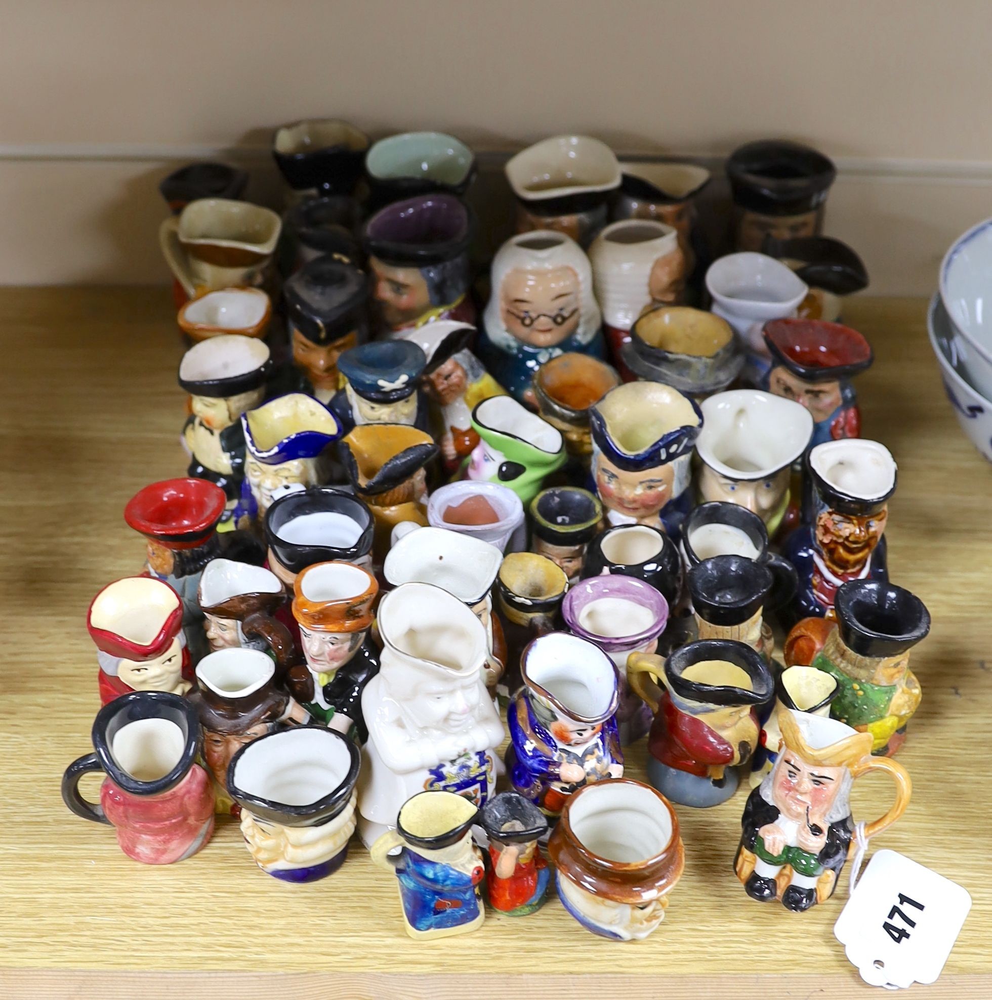 Fifty two miniature Toby jugs