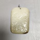 A Chinese carved jade plaque 6.5cm