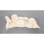 A 19th century Chinese carved ivory figure of Budai 11cm