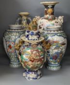 A pair of Japanese crackle ware vases, a lidded vase and 2 others, tallest 60 cms high.
