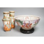 A pair of Chinese Canton famille rose vases and a bowl on stand