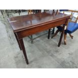 An Edwardian rectangular mahogany folding tea table, width 92cm, depth 46cm, height 75cm