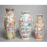 Three 19th century Chinese famille rose vases,Tallest 25 cms high.
