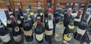 Twenty four bottles of assorted red wine