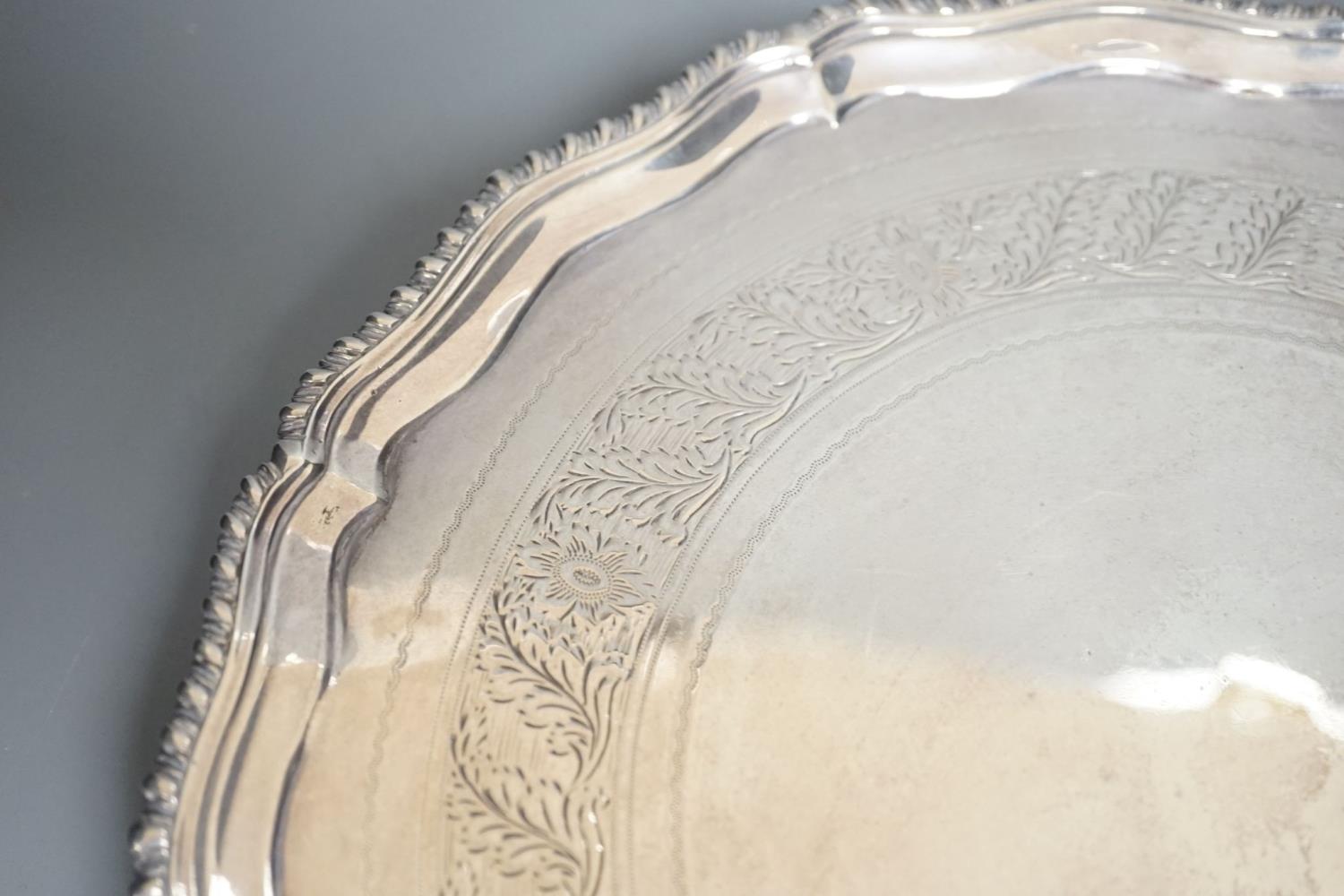 A George III silver salver, with gadrooned border, on three shell feet, Ebenezer Coker, London, - Image 3 of 5