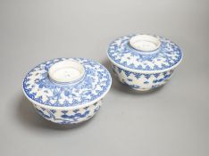 A pair of Japanese underglaze blue rice dishes and covers,Cover 13 cms diameter.