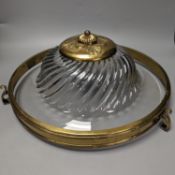 A circular brass and glass plathonier, first half 20th century42 cms diameter.