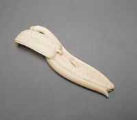 A Japanese ivory model of a banana, Meiji period 12cm
