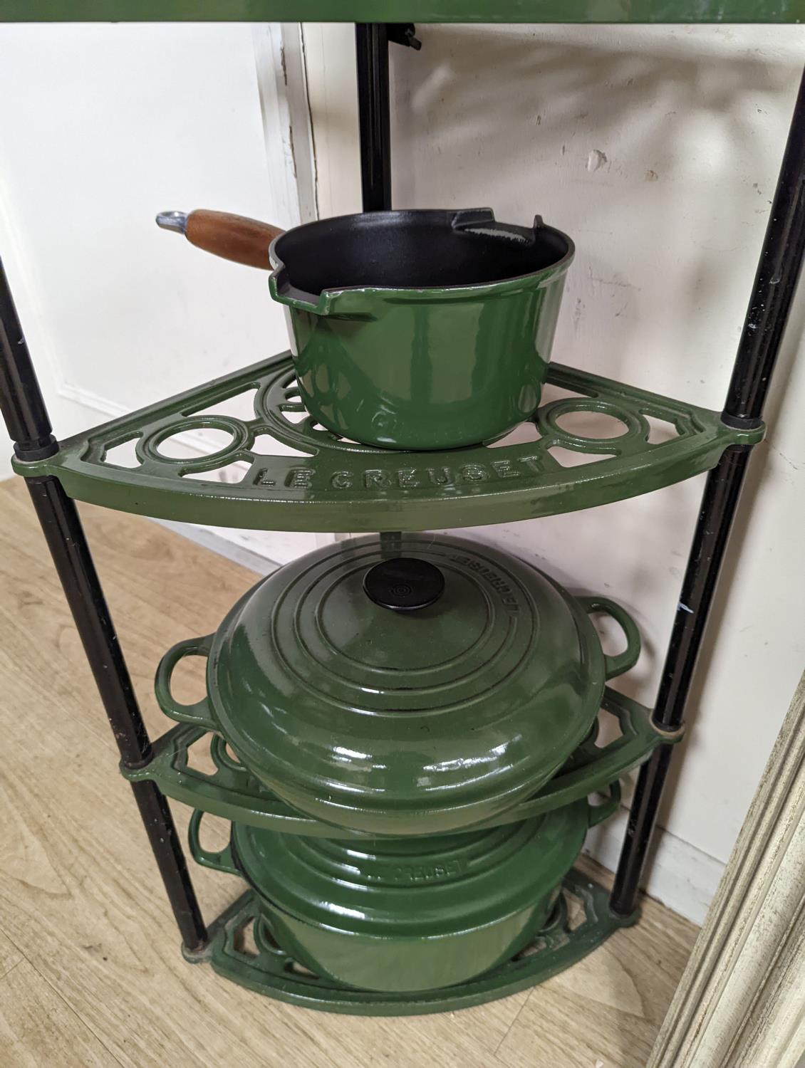 A green enamel Le Cruset pot stand, three pans and a bottle rack,stand 90 cms high. - Image 4 of 5