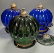 Three coloured glass pendant fluted globe shaped lamps - two blue, one green,30 cms high.