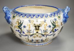 A French 19th century Gien pottery jardiniere with dolphin handles41 cms wide including handles.