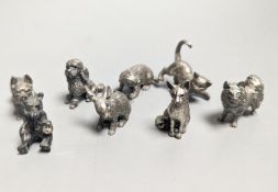 Four modern miniature freestanding model animals, including, badger, two dogs and a cat, JJSM,