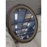 An Edwardian oval gilt framed wall mirror, width 72cm, height 87cm