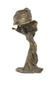 After Raoul Larche (1860-1912). A bronze 'Loie Fuller' table lamp,the dancer with raised arms,