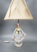 A German porcelain ‘dancing lady’ lamp,figure 29 cms high.