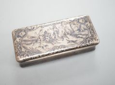 A 19th century French white metal and niello snuff box, 78mm, decorated with hunting scene.
