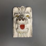 A hand carved painted wood lions head wall mount 24cm