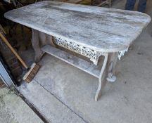 A rectangular weathered teak garden table, length 120cm, depth 62cm, height 65cm