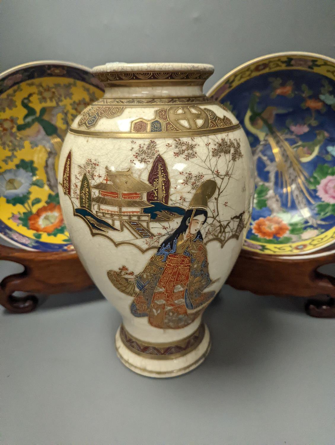 A Japanese Satsuma vase of a geisha and two Japanese yellow and a blue ground bowls each on wooden - Image 2 of 7